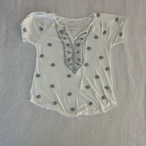 White and silver blouse